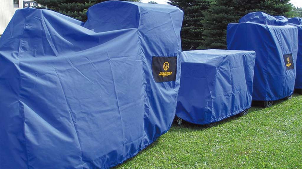 Protective covers for Wattman trackless train shielding from dust and water