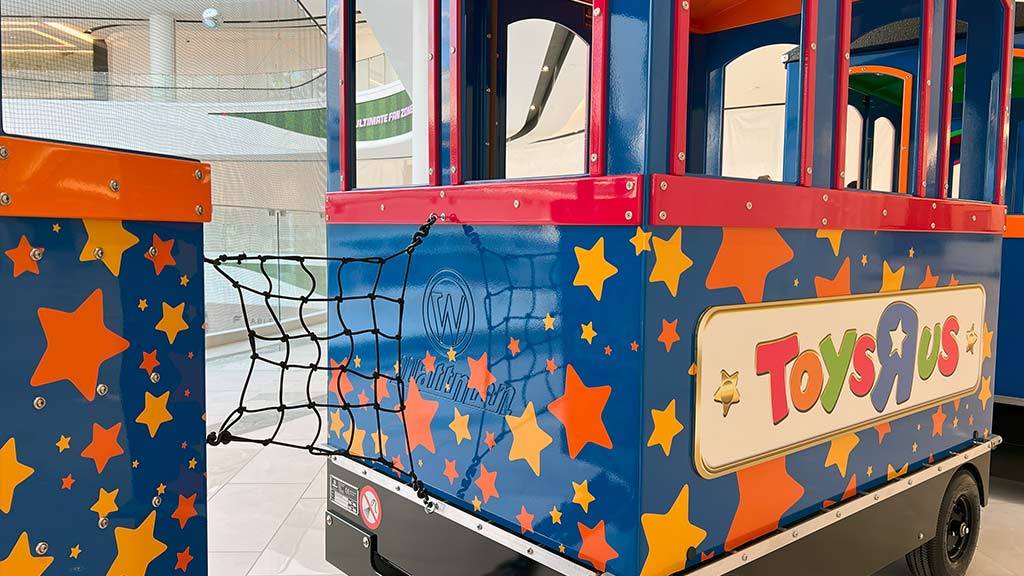 Customized Wattman train with branded colors and company logos