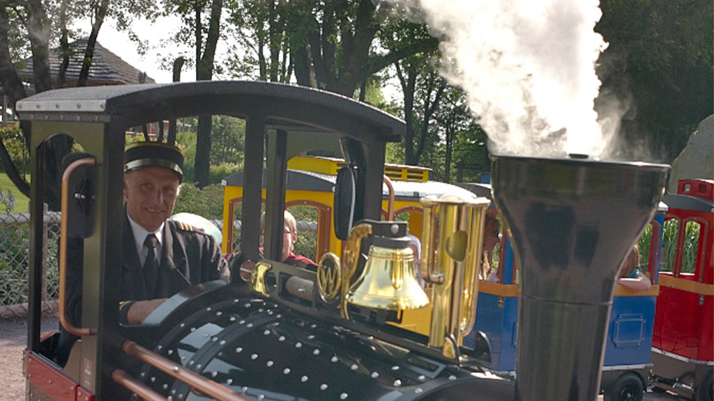 Wattman train releasing smoke from chimney for authentic steam effect