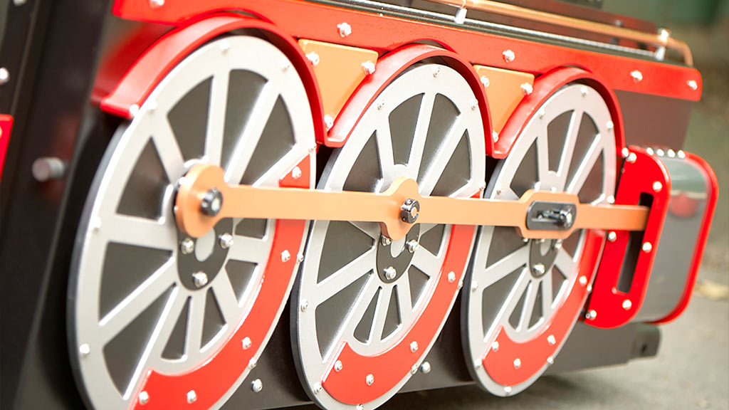 Rotating Wheels in Motion on Wattman train creating a lifelike train ride