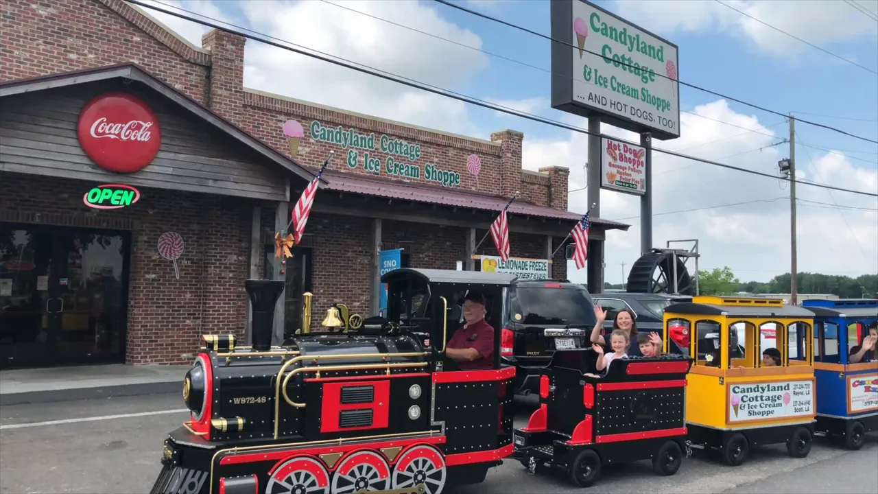 Wattman electric trackless train operated by Candyland Cottage at a U.S. event — children's entertainment rental