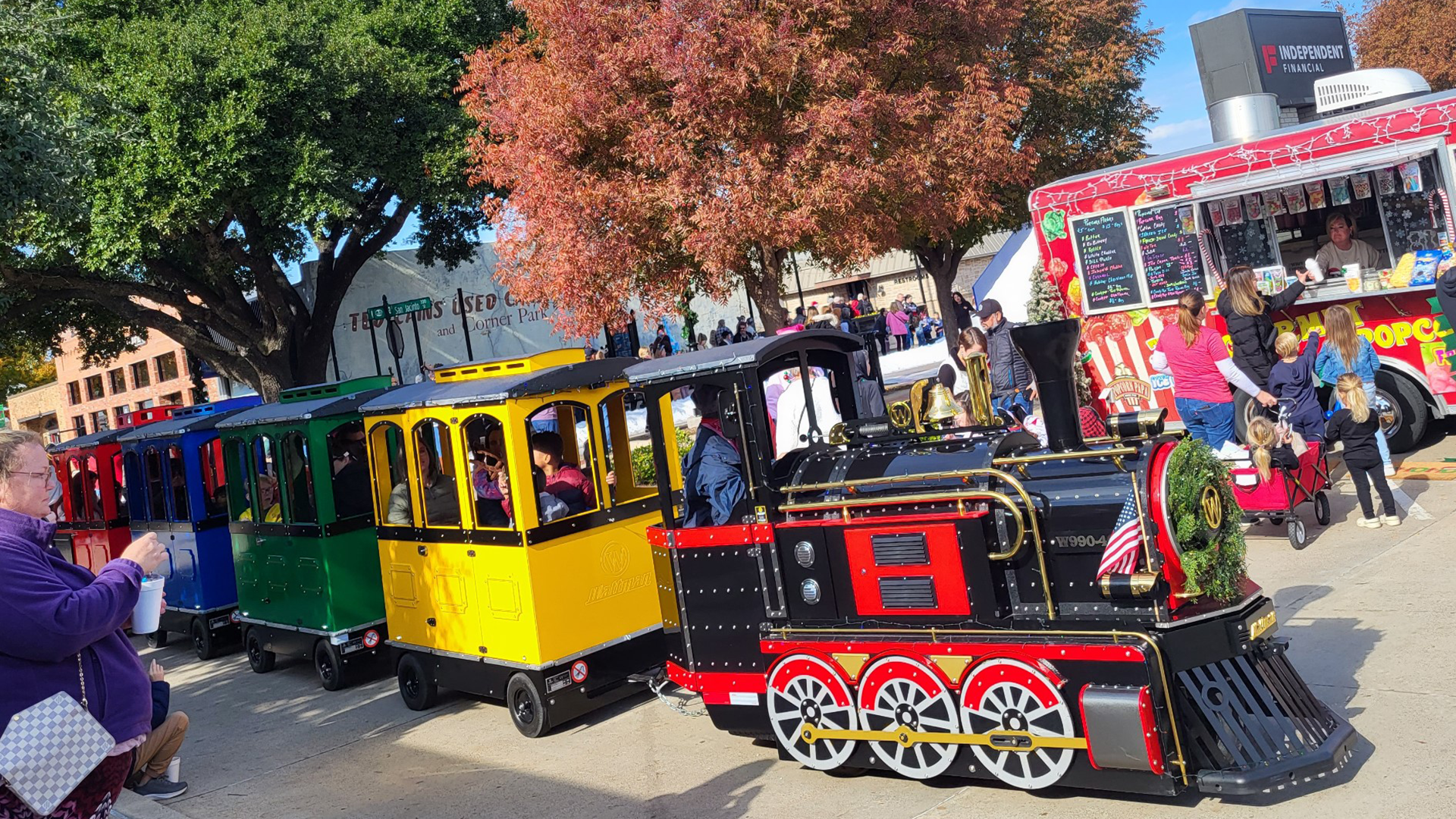 Li'l Grande Trains Wattman trackless train at a US fair event showcasing long-term warranty reliability