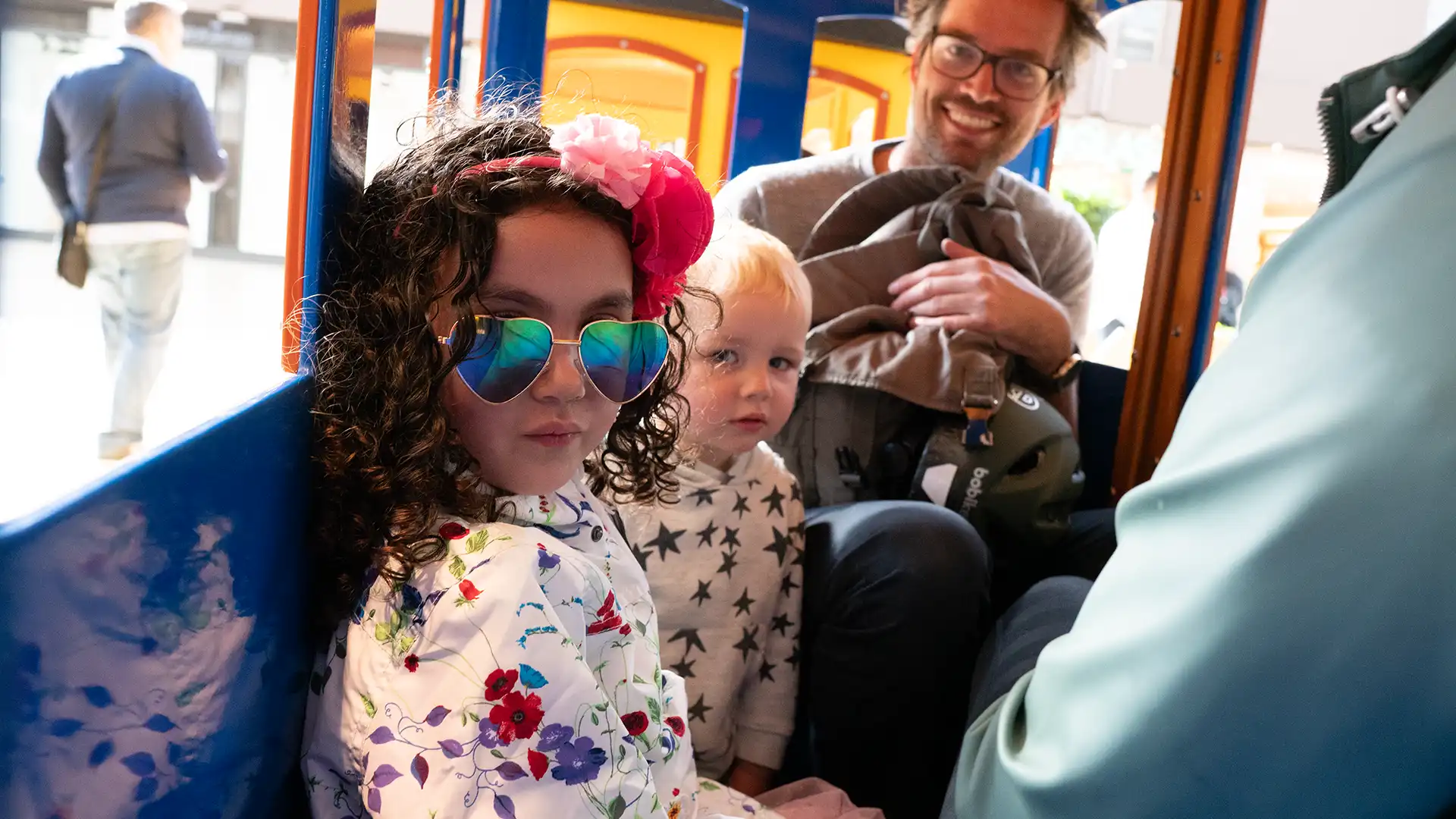 Wattman Maxi Express electric trackless train in outdoor operation — full passenger capacity at a U.S. park or attraction